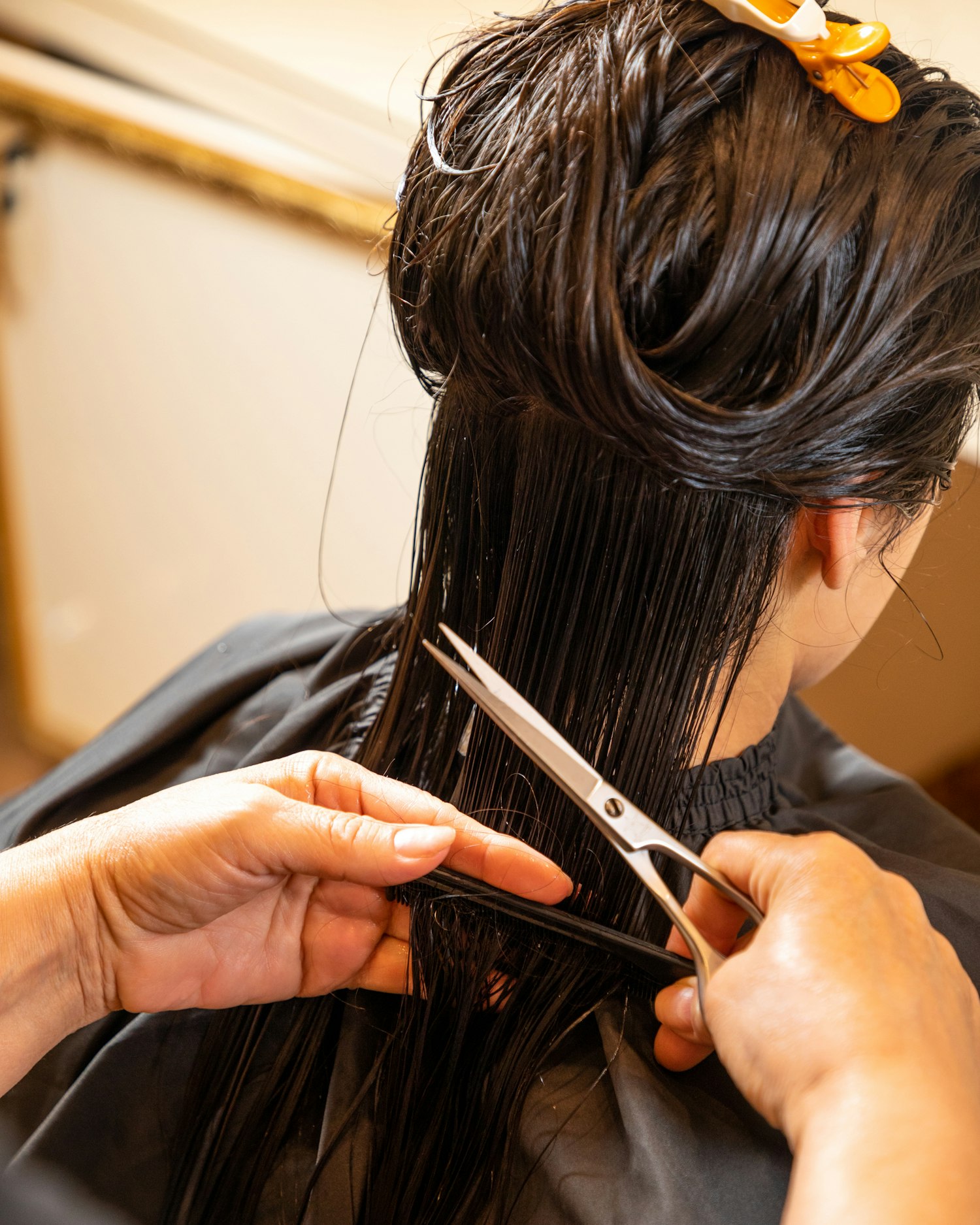 Stylist sectioning hair